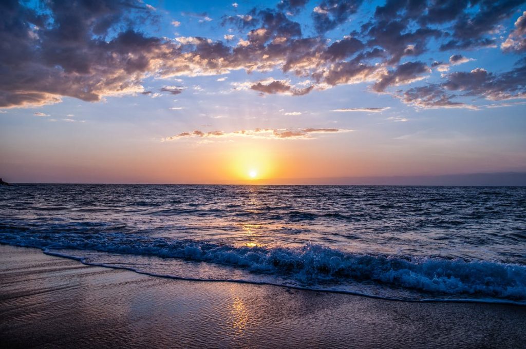 Image of a sea beach and sun rising